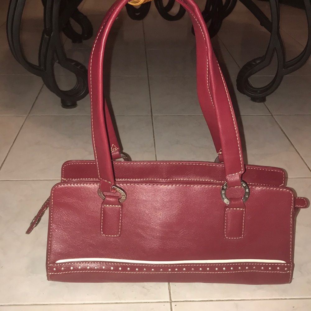 Red handbag. It’s brand is Tommy Hilfiger.
